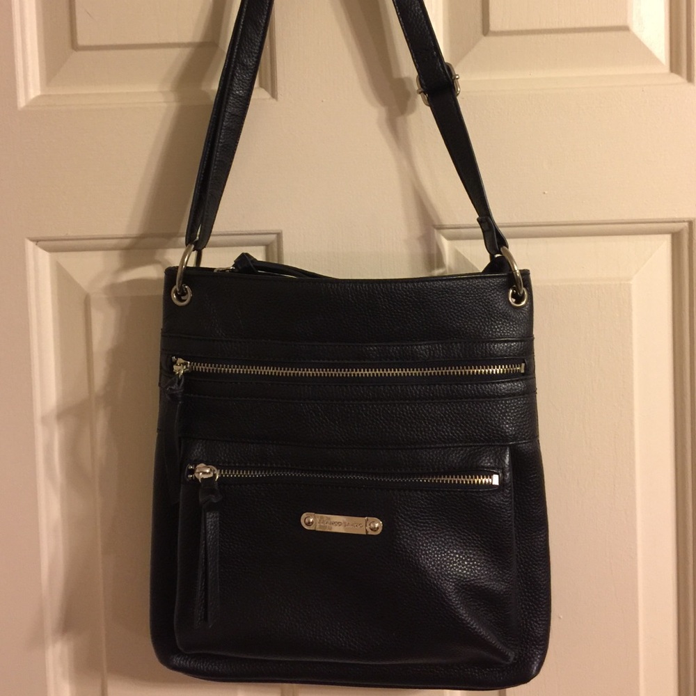 Slightly used Crossbody. Absolute mint condition